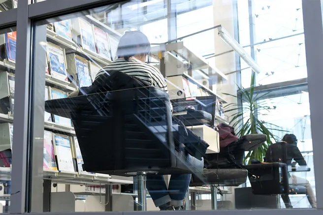 A student studying in the library