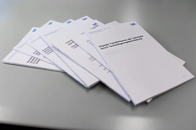 A stack of publications lying on a table